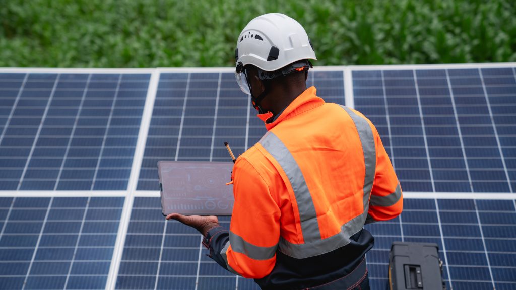 Can You Live Off‑Grid in Australia? Rules, approvals, and what you actually need 2 Service engineer check and maintenance solar panels in cultivation area. Clean energy concept.