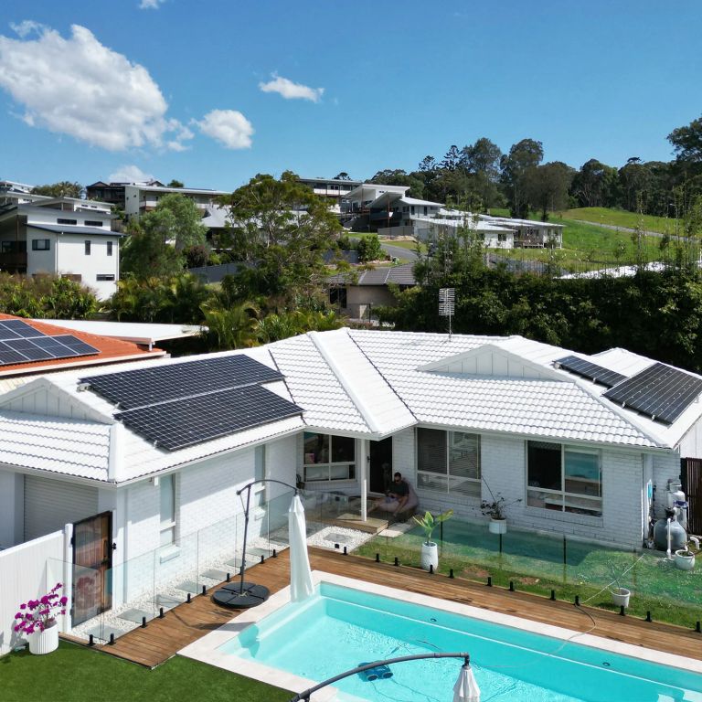 Drone photo of a rooftop solar system with a backyard pool, Northern Rivers