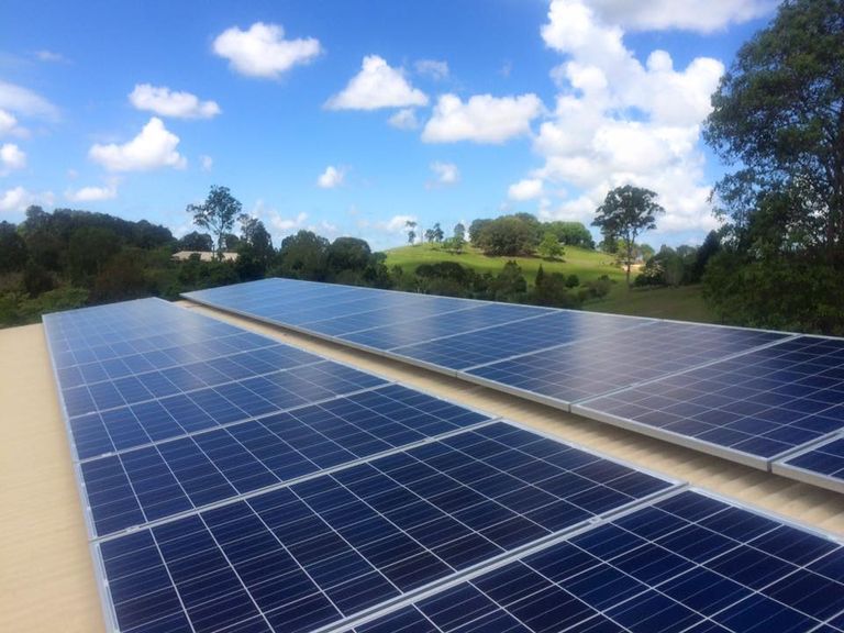 8.0kW solar panel array on a Murwillumbah roof with green hills behind
