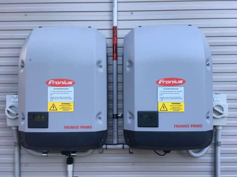 Twin Fronius Primo inverters wall mounted at a residential install